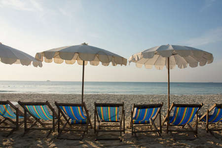 umbrella and beach chair on the beachの写真素材