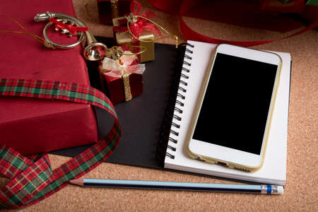 smart device and holiday decoration on wood table