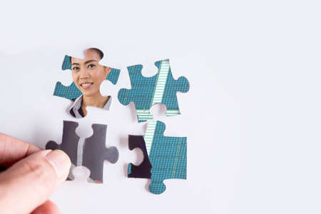 jigsaw puzzle with image of business manの写真素材