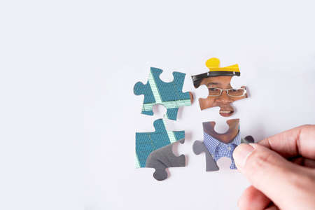jigsaw puzzle with image of business man
