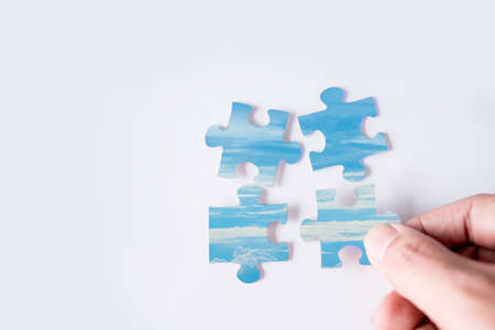 jigsaw puzzle with image of blue skyの写真素材