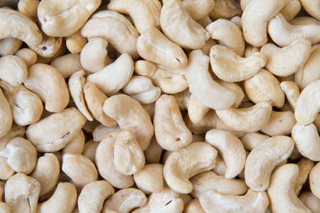 Cashew nuts, close up shot against white background