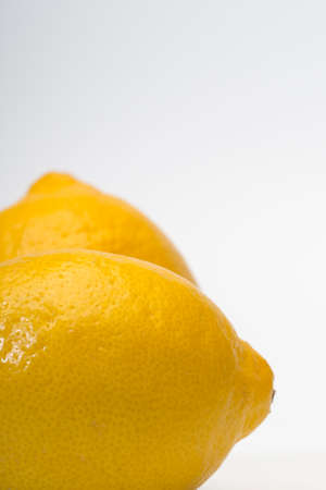 Pair of lemons, ioslated on white with copy spaceの写真素材