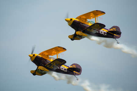 Trig Aerobatic team duo, displaying their Pitts Specials at Abingdon Air Show, UK, during May 2014のeditorial素材