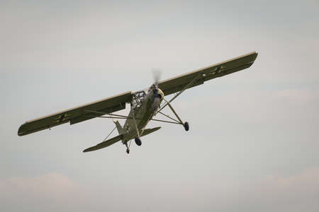Abingdon, UK - MAy th 2014: A vintage Fieseler Storch, German WW2 Reconnaissance aircraft, in flight...