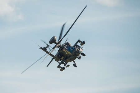 Duxford,UK - 25 May 2014: An Apache helicopter in flight at  Duxford D-Day Airshowのeditorial素材