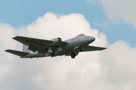 Cosford, UK - 8 June 2014: MidAir Squadron's English Electric Canberra, displaying at the RAF Cosford Airshow. Cosford, UK - 8 June 2014: MidAir Squadron's English Electric Canberra, displaying at the RAF Cosford Airshow.