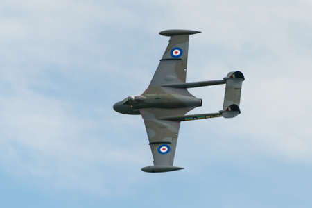 Cosford, UK - 8 June 2014: A vintage De Havilland Venom British jet fighter, displaying at the RAF...