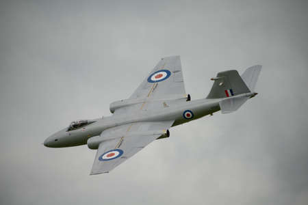 Cosford, UK - 8 June 2014: MidAir Squadron's English Electric Canberra, displaying at the RAF Cosford Airshow. Cosford, UK - 8 June 2014: MidAir Squadron's English Electric Canberra, displaying at the RAF Cosford Airshow.