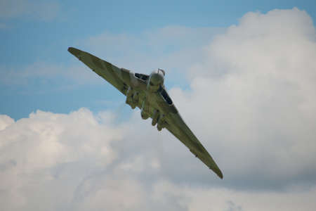 Cosford, UK - 8 June 2014: Vintage British restored Vulcan Bomber XH558, displaying at the RAF Cosford Airshow.のeditorial素材