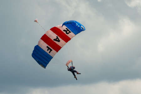 Cosford, UK - 08 June 2014: RAF Falcon parachute display team seen at RAF Cosford Airshow.