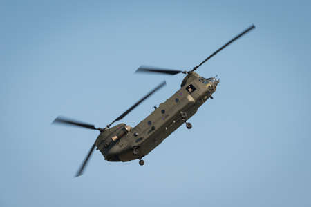Fairford, UK - 12 July 2014: An RAF Chinook helicopter displaying at the Royal International Air Tattoo.のeditorial素材