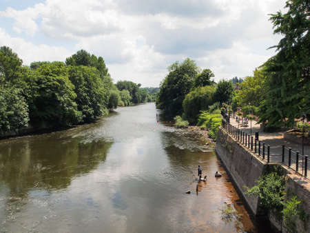 Bridgnorth, UK - 19 June, 2014: Fisherman seen at side of river.のeditorial素材