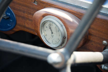 Biggleswade, UK - 29 June 2014: A vintage car clock in a Jowett Type C car (1926) on display at the Shuttleworth Collection air show.のeditorial素材