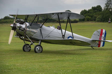 Biggleswade, UK - 29 June 2014: A vintage  Hawker Tomtit bi-plane on display at the Shuttleworth Collection air show.のeditorial素材