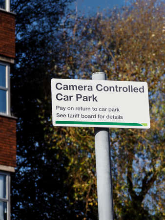 Camera controlled car park sign in UK town.