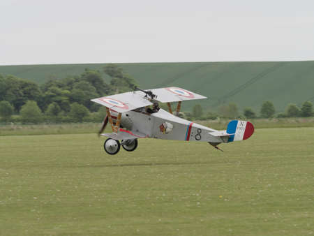 Duxford, UK - May 23rd 2015: Vintage French Nieuport 17 Biplane of First World War, displaying at Duxford VE Day Airshowのeditorial素材