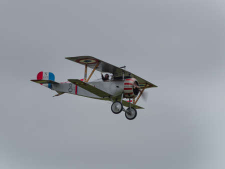 Duxford, UK - May 23rd 2015: Vintage French Nieuport 17 Biplane of First World War, displaying at Duxford VE Day Airshowのeditorial素材