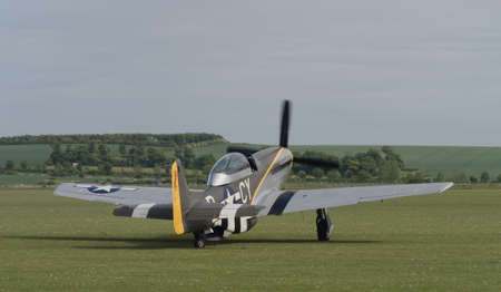 Duxford, UK - May 23rd 2015: A vintage US P51 Mustang aircraft, flying at Duxford VE Day Airshowのeditorial素材