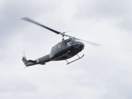 Yeovilton, UK - 11th July 2015: Vintage Bell 'Huey' helicopter flying at Yeovilton Air Day.