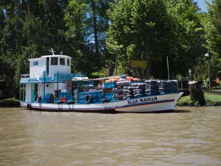 Buenos Aires, Argentina - 29th October 2015: Grocery delivery boat seen during a boat trip in the River Plate delta.のeditorial素材