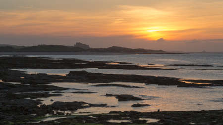 Evening coastal lanscape view from Seahouses, Northumberland, UKの写真素材