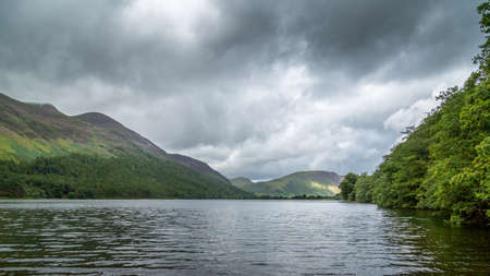 A landscape view of Buttermere, one of the lakes in the Lake District, Cumbria, United Kingdom.の写真素材