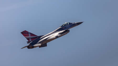 YEOVILTON, UK - 7th July 2018: An F16 fighter jet in flight over Yeovilton RNAS airfield in south western UKのeditorial素材