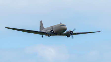 A vintage dakota aircraft in flight