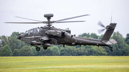 Old Warden, UK - 4th August 2019: A British Army Apache helicopter taking off from airfield