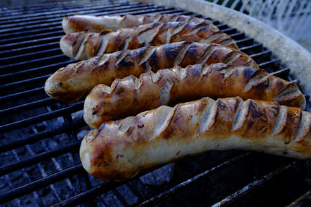 grilled bratwurst on grillの写真素材