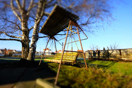 an old swing in focusの写真素材