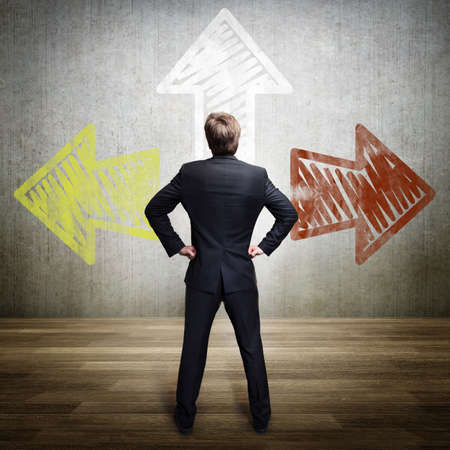businessman has to choose between 3 options の写真素材