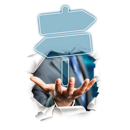 businessman presenting a sign with two different ways の写真素材