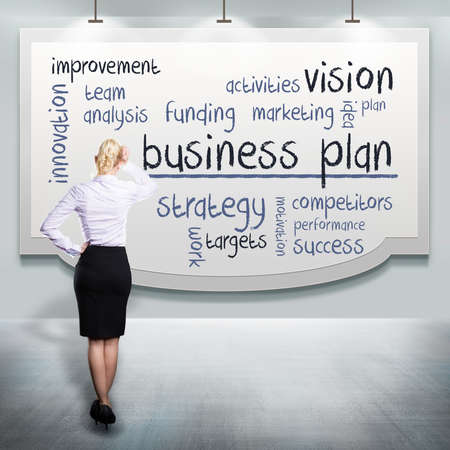 businesswoman thinking about a business plan の写真素材