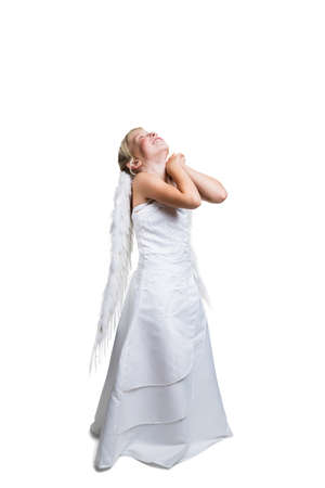 little blonde angel looking aboveの写真素材