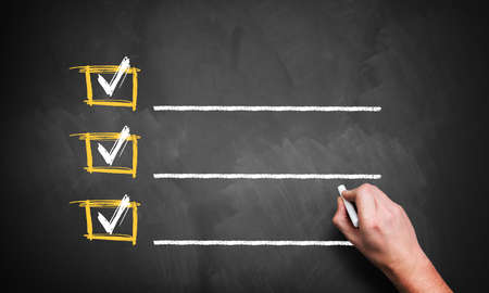 checklist on a chalkboardの写真素材