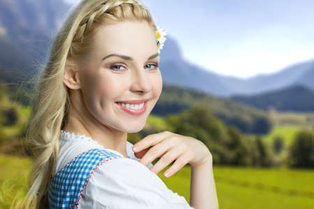 beautiful woman in a traditional bavarian dirndlの写真素材
