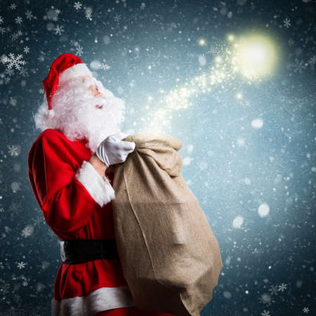 Santa Claus with Christmas magicの写真素材