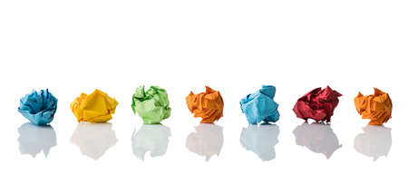 crumpled paper symbolizing different solutions isolated on white