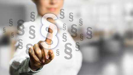 businesswoman selects an paragraph articleの写真素材