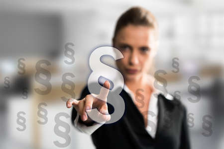 businesswoman selects an paragraph articleの写真素材