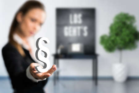 Businesswoman presenting a paragraph symbol and the phraseの写真素材