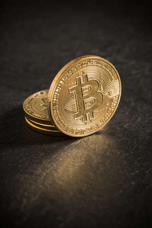 bitcoins on slate backgroundの写真素材