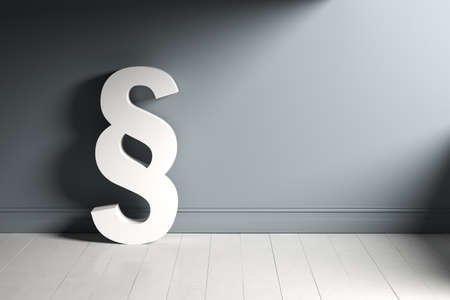 3D rendered paragraph symbol leaning at wall in an empty roomの写真素材