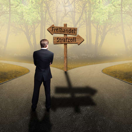 businessman standing at a crossroad having to decide between free trade and tariffs (with road signs...