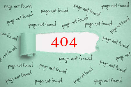 torn paper revealing the error code 404 used on webservers, standing for page not found