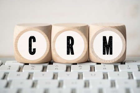 cubes showing the acronym "CRM" on a computer keyboardの写真素材