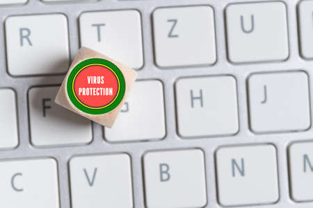 cubes with the word "JOB" and a paragraph symbol on a keyboardの写真素材