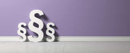 three paragraph symbols standing in front of a blue wall